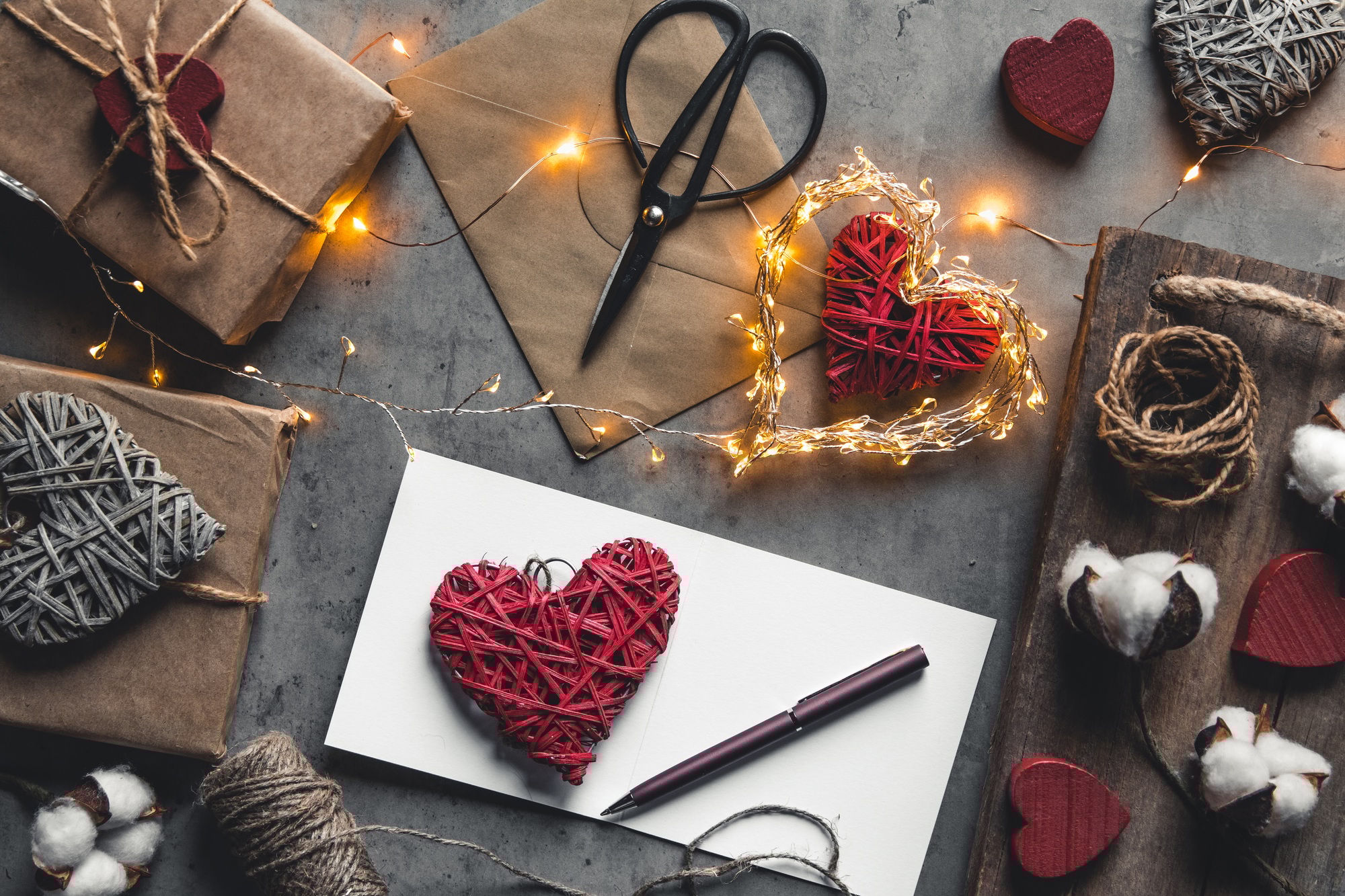 Love message valentine's day. Preparation, gift wrapping, cotton flowers and postcard