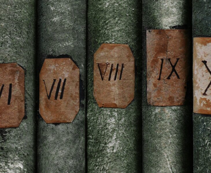 Old books with Roman numerals in the library