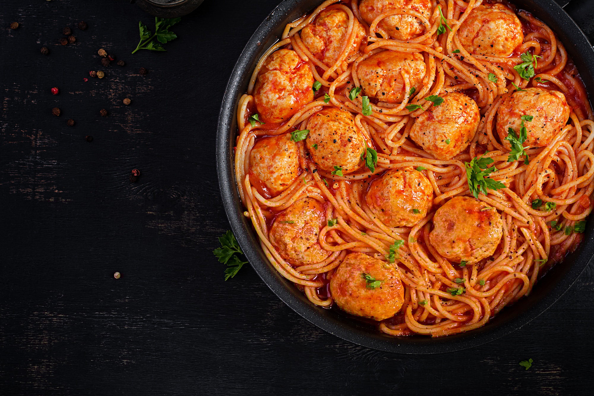 Spaghetti pasta with meatballs in tomato sauce. Italian pasta. Top view, flat lay