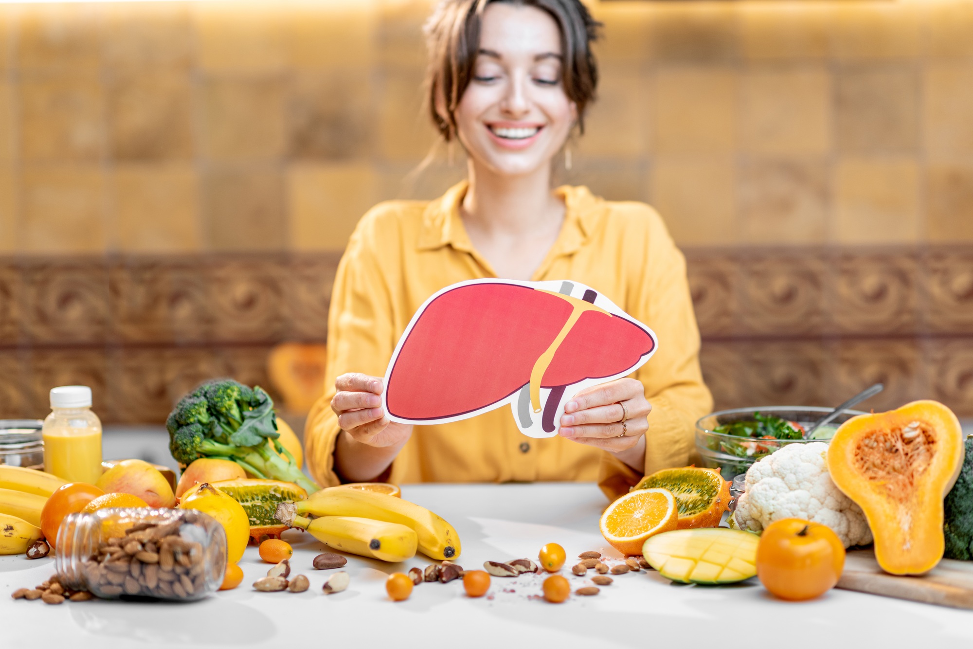 Human liver model and variety of healthy fresh food