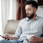 Man Answering Text Messages